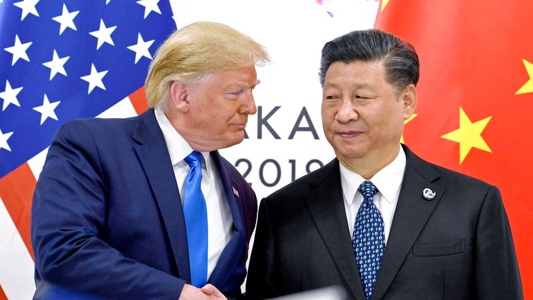 Дональд Трамп пожимает руки с президентом Китая Си Цзиньпином во время встречи в кулуарах саммита G-20 в 2019 году. PIC: AP