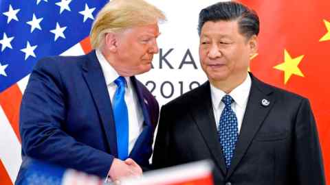 Дональд Трамп и Си Цзиньпин во время встречи в кулуарах саммита G20 в Осаке, Япония, 29 июня 2019 года