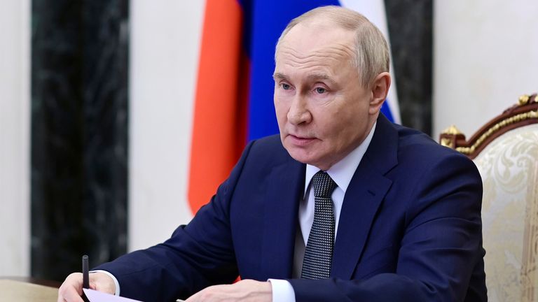 Владимир Путин возглавляет заседание Совета Безопасности в Кремле. PIC: AP